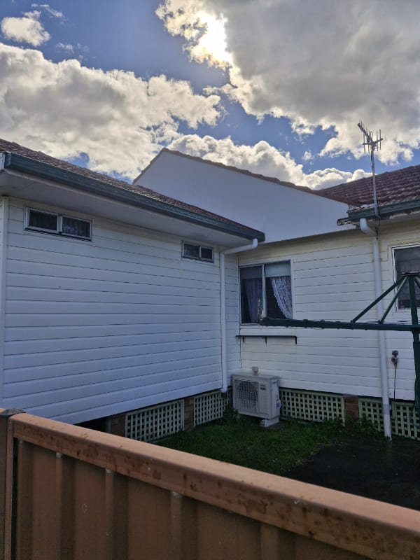 Soft washing weatherboard homes